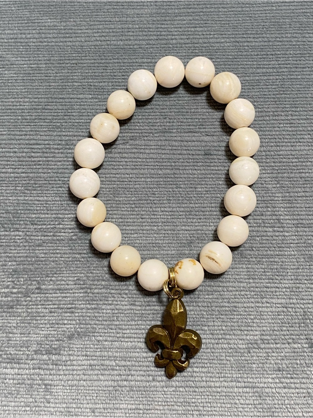 Vintage Bone Beads combined w/ bronze alloy Bracelet w/ Gold Fleur-de-Lis Charm